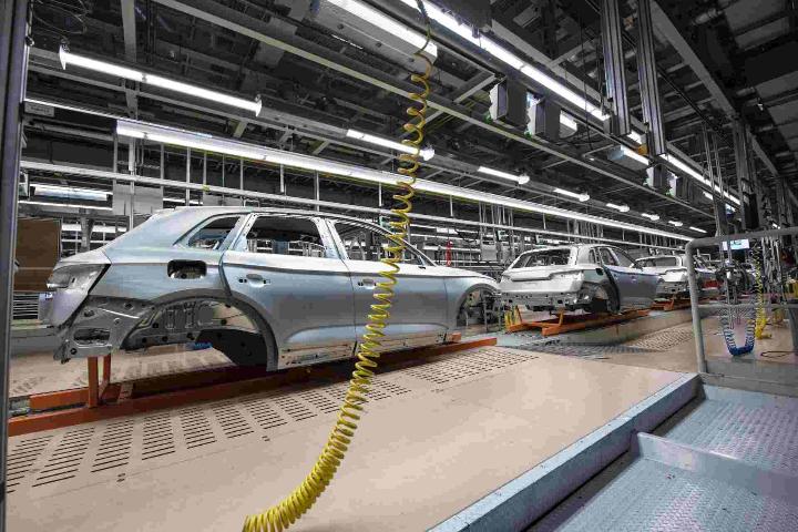 Manufacture of motor vehicles in the automotive industry.